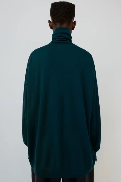 Shop Acne Studios Oversized Polo Neck Sweater Bottle Green