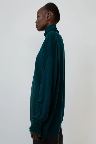 Shop Acne Studios Oversized Polo Neck Sweater Bottle Green