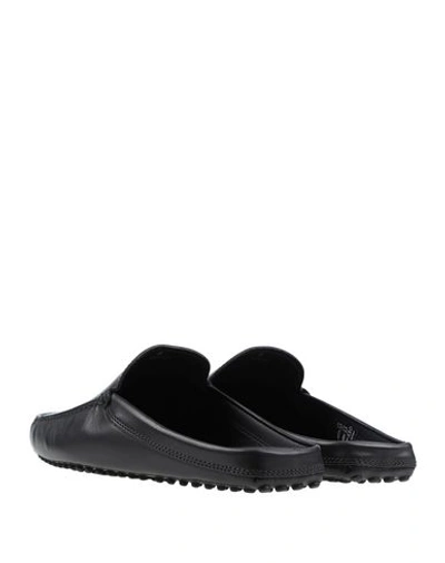 Shop Tod's Mules & Clogs In Black