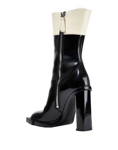 Shop Alexander Mcqueen Ankle Boots In Ivory