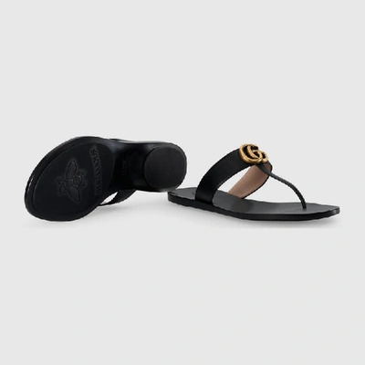 GUCCI LEATHER THONG SANDAL WITH DOUBLE G 497444A3N001000