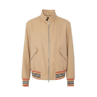 Shop Burberry Icon Stripe Detail Cotton Gabardine Harrington Jacket In Honey