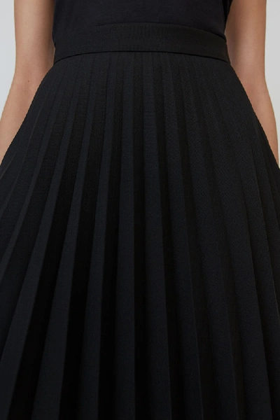 Shop Acne Studios Asymmetrical Pleated Skirt Black