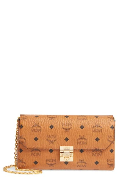 Shop Mcm Millie Monogrammed Leather Crossbody Bag In Cognac