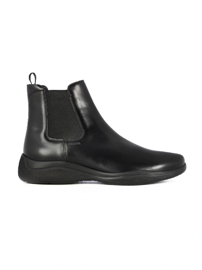 Shop Prada Beatless Chelsea Leather Boots In Black