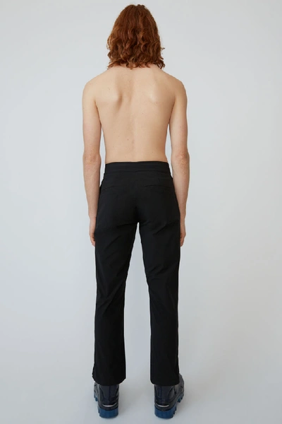 Shop Acne Studios Ski-inspired Trousers Black