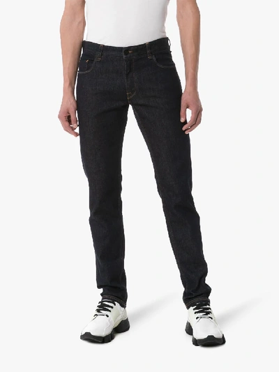 Shop Fendi Logo Pocket Slim Jeans In Blue