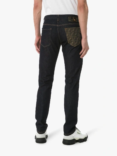 Shop Fendi Logo Pocket Slim Jeans In Blue