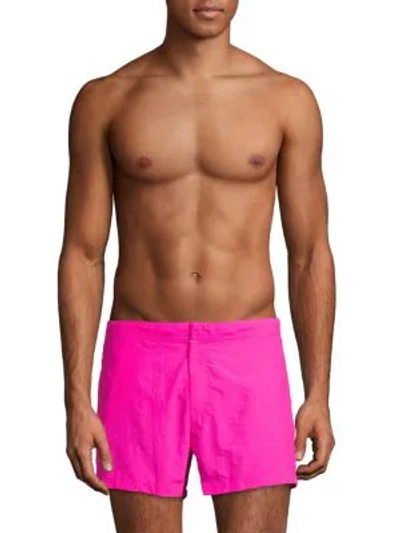 Shop Solid & Striped Elasticized Swim Shorts In Neon Pink