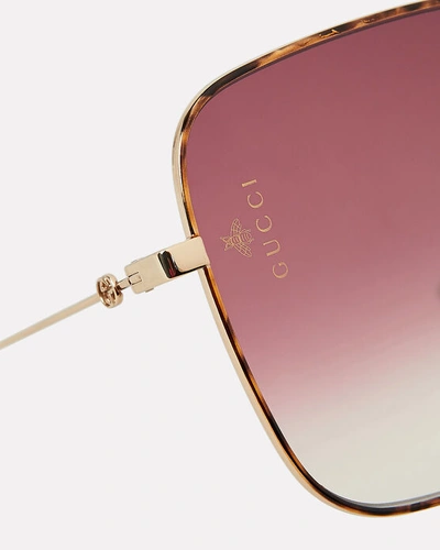 Shop Gucci Metal Frame Sunglasses In Gold