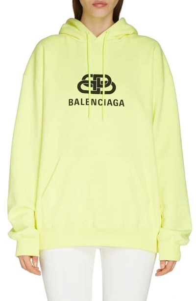 Shop Balenciaga Interlocking Bb Logo Neon Hoodie In Lime/ Black
