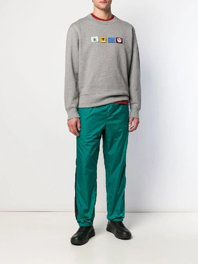 Shop Acne Studios Contrasting Stripe Track Trousers In Green