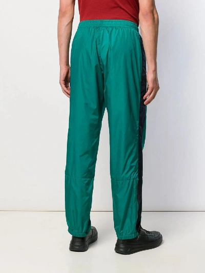 Shop Acne Studios Contrasting Stripe Track Trousers In Green