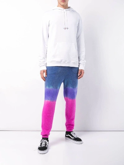 Shop The Elder Statesman Knitted Tie-dye Track Trousers In Multicolor