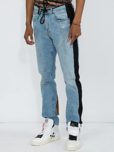 Shop Off-white Side Panel Jeans
