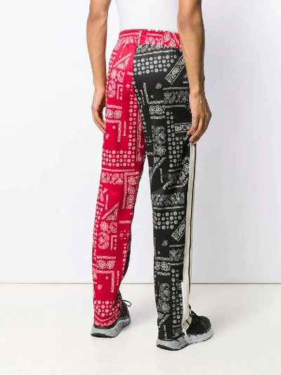 Shop Palm Angels Bandanna Print Trousers In Multicolor