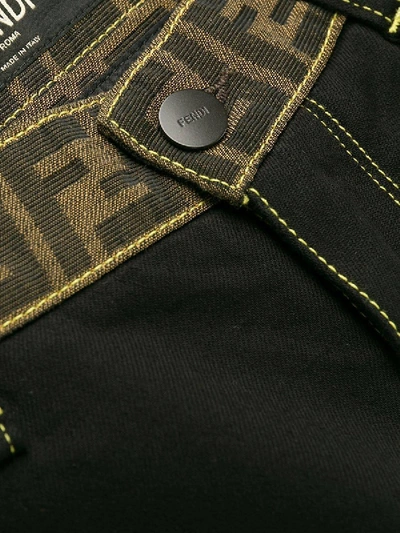 Shop Fendi Monogram Waistband Jeans Black Brown