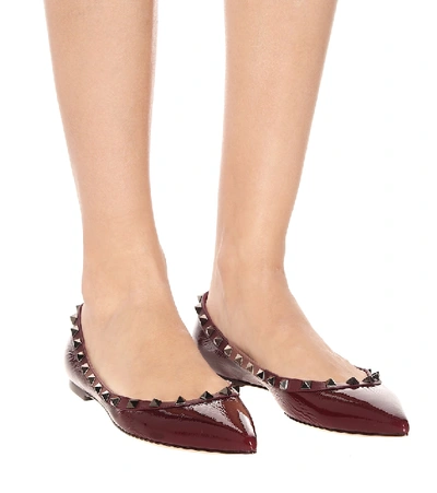 Shop Valentino Rockstud Patent Leather Ballet Flats In Red