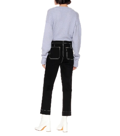 Shop Khaite Raquel Cropped High-rise Flare Jeans In Black