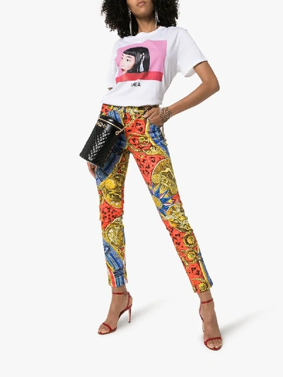 Shop Moschino Greek Gods Printed Skinny Jeans In Multicolour