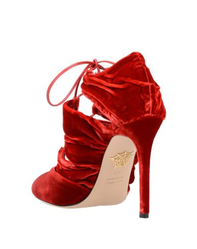 Shop Charlotte Olympia Booties In Red