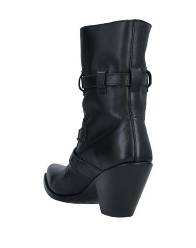 Shop Celine Ankle Boots In Black