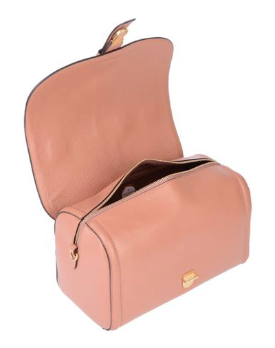 Shop Coccinelle Handbag In Pastel Pink