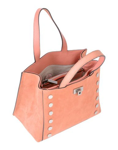 Shop Coccinelle Handbag In Pale Pink