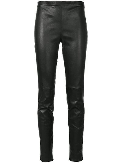 Shop Saint Laurent Mid Waist Leather Leggings In Black