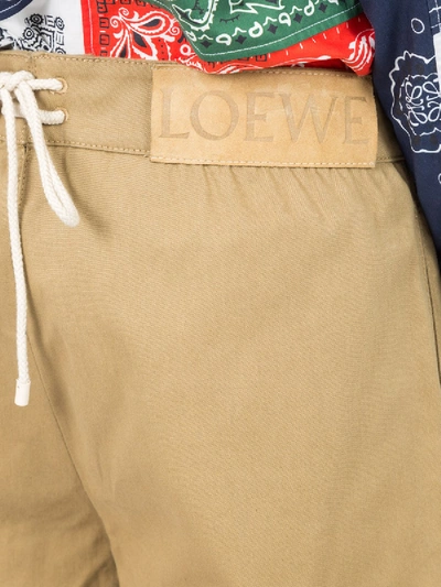 Shop Loewe Lion Printed Shorts In Neutral