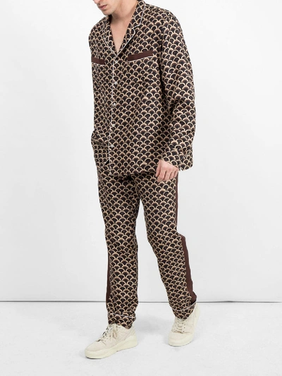 Shop Valentino Printed Pants In Brown