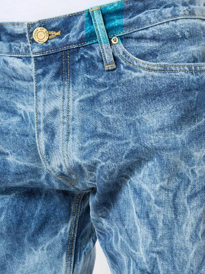 Shop Fear Of God Indigo Bleached Effect Slim-fit Jeans