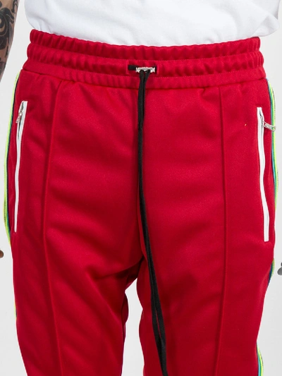 Shop Amiri Skinny Trackpants Red