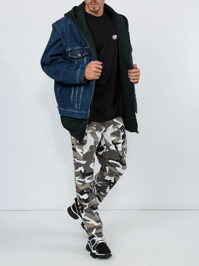 Shop Balenciaga Army Camo Pants