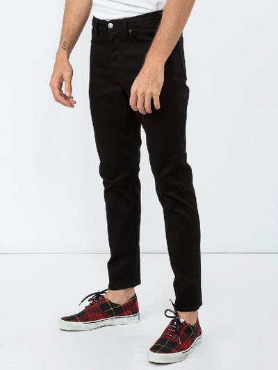 Shop Acne Studios River Tapered Jeans Dark Blue