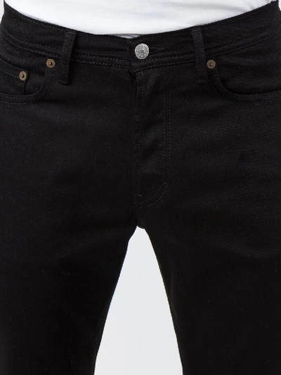 Shop Acne Studios River Tapered Jeans Dark Blue