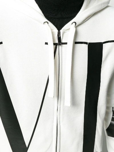Shop Valentino Letters Print Zipped Hoodie In White