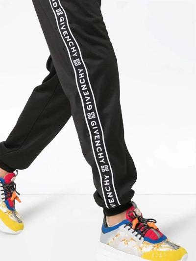 Shop Givenchy Logo Stripe Track Pants Black