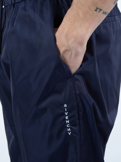 Shop Givenchy Track Pants In Blue