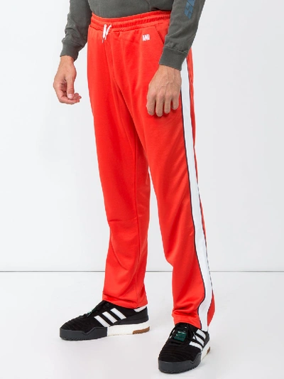 Shop Ami Alexandre Mattiussi Track Pants With Contrasted Bands Red