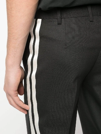 Shop Neil Barrett Side Stripe Trousers Black