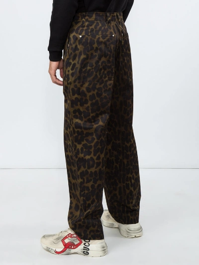 Shop Burberry Leopard Print Trousers In Brown