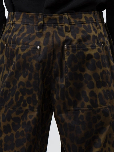 Shop Burberry Leopard Print Trousers In Brown