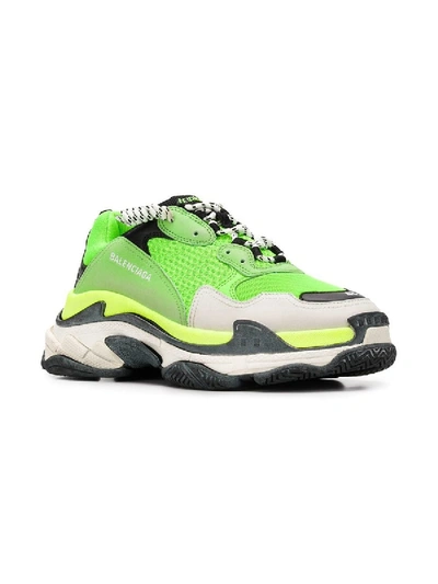 Shop Balenciaga Lime Green Triple S Sneakers