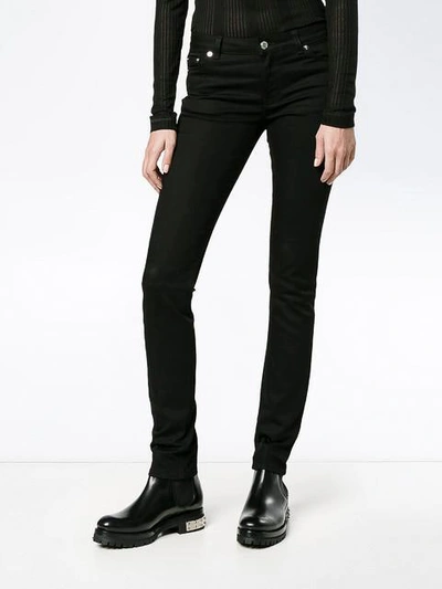Shop Givenchy Star Motif Jeans
