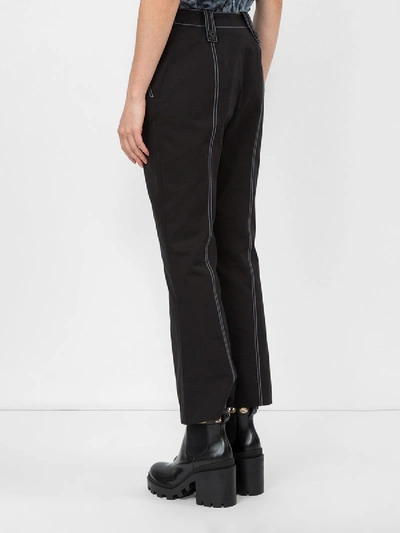 Shop Givenchy Stitch Detail Kick Flared Trousers