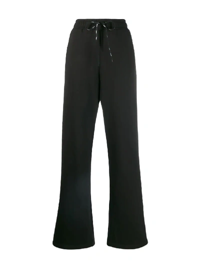 Shop Fendi Logo Stripe Track Pants In Black