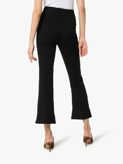 Shop Roland Mouret Goswell Flared Split Hem Trousers In Black