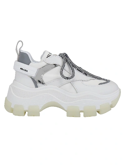 Shop Prada Pegasus Sneakers In Bianco/argento
