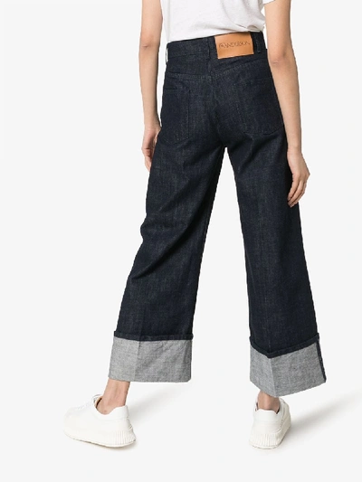Shop Jw Anderson Turned Cuff Straight Leg Jeans In Blue